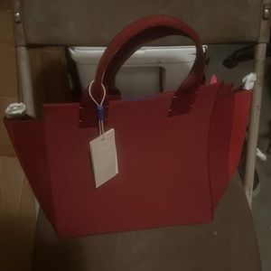 Brand new with tags bright red the handbag